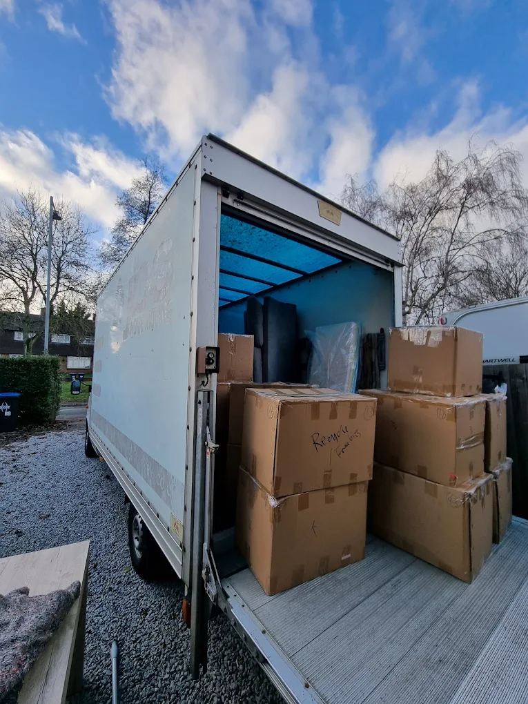 Boxes & furniture secured on the Luton van